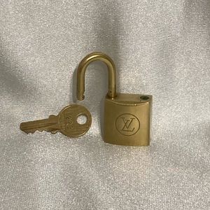 Louis Vuitton Vintage lock and key set #223